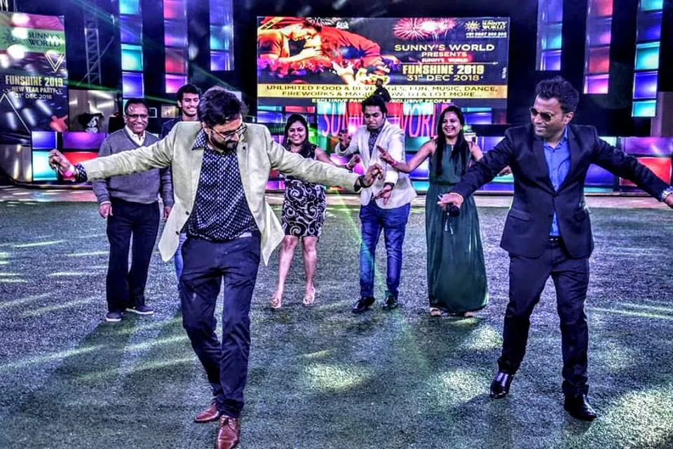 Corporate team members enjoying collaborative employee engagement activities and group challenges during a corporate event