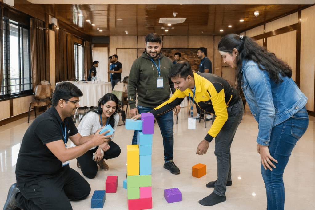 Outdoor team building activities in Lonavala — corporate group completing adventure challenge at resort