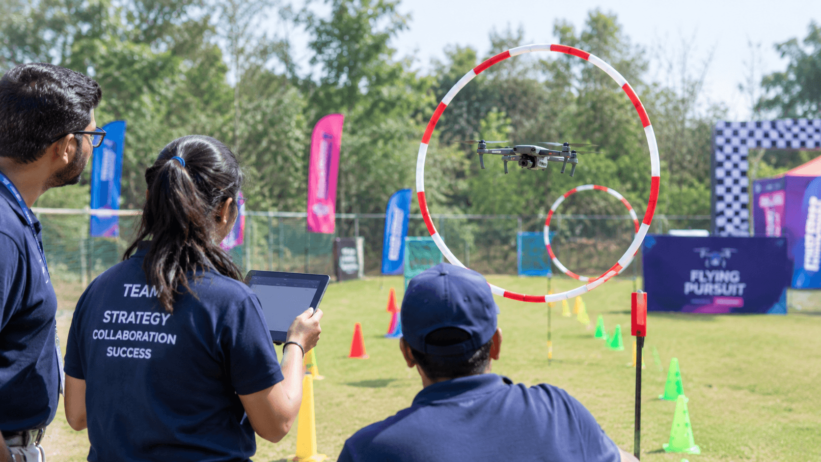 Corporate team participating in a Flying Pursuit drone team building activity